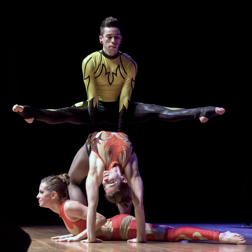 TJ Santiago, Kelsey Strauch, and Julie Krygsman perform contortion in Big Top Broadway